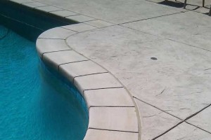 Pool Coping & Textured Concrete Deck